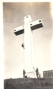 Putting bulbs back on cross after painting Side Of Mt. Davidson Coss1928